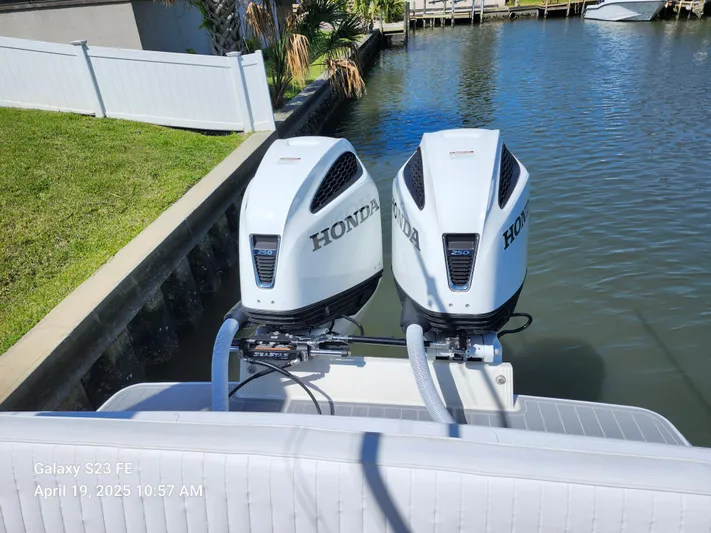  Yacht Photos Pics Twin Honda outboard engines on a 2001 Jupiter 31 Open Center Console boat.