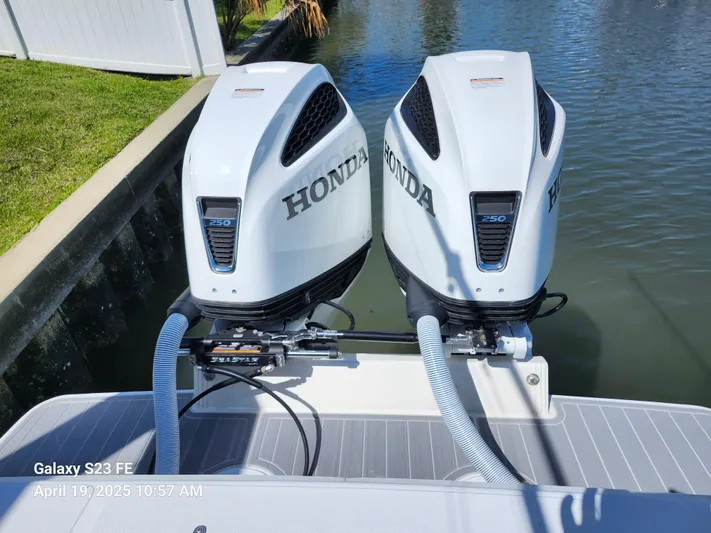  Yacht Photos Pics Twin Honda outboard motors on a 2001 Jupiter 31 Open Center Console boat.
