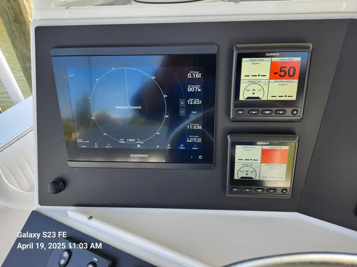  Yacht Photos Pics Garmin navigation display on 2001 Jupiter 31 Open Center Console boat dashboard.
