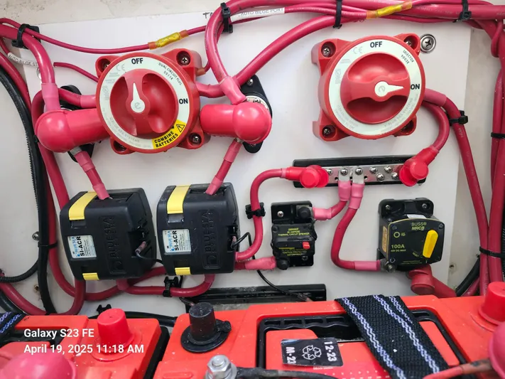  Yacht Photos Pics Electrical system of a 2001 Jupiter 31 Open Center Console boat with switches and wiring.