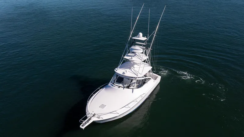  Yacht Photos Pics 2014 Viking 42 Open yacht cruising on calm waters.