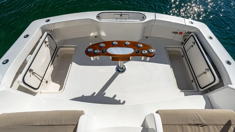  Yacht Photos Pics 2014 Viking 42 Open yacht cockpit with seating and fishing rod holders.