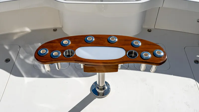  Yacht Photos Pics 2014 Viking 42 Open yacht cockpit with polished wood and stainless steel rod holders.