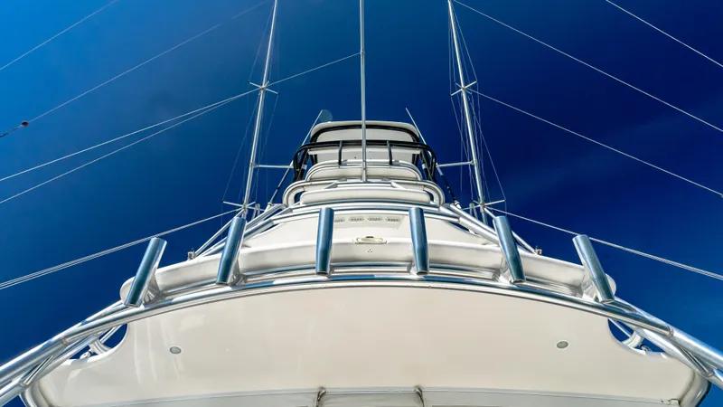  Yacht Photos Pics 2014 Viking 42 Open yacht, viewed from below against a clear blue sky.