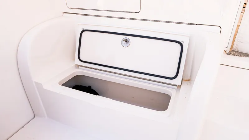  Yacht Photos Pics Storage compartment on 2014 Viking 42 Open boat, featuring a secure latch.