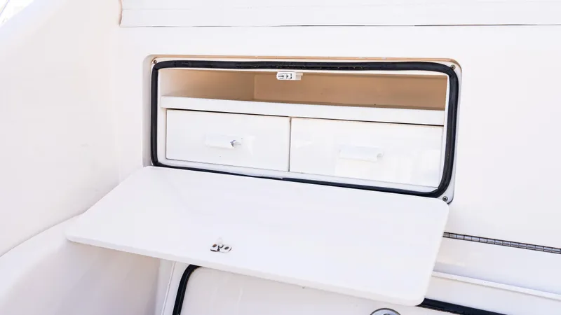  Yacht Photos Pics Storage compartment with drawers on a 2014 Viking 42 Open boat.