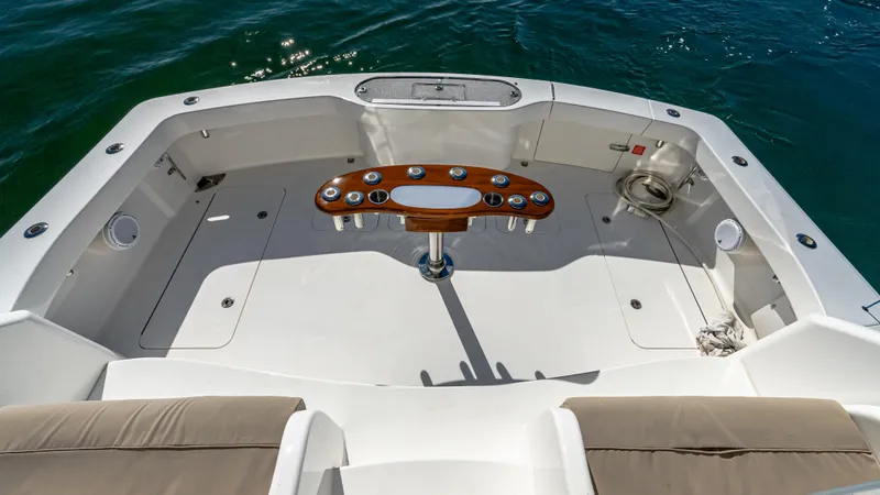  Yacht Photos Pics 2014 Viking 42 Open boat deck with fishing rod holders and seating.