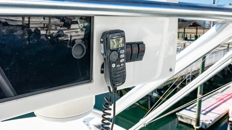  Yacht Photos Pics Control panel of 2014 Viking 42 Open yacht with radio and switches.