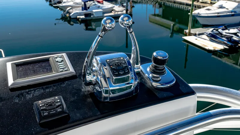  Yacht Photos Pics Control panel of a 2014 Viking 42 Open yacht at a marina.