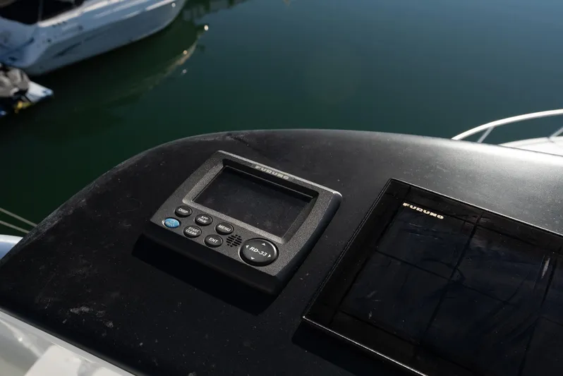  Yacht Photos Pics Control panel on 2014 Viking 42 Open yacht, docked at marina.