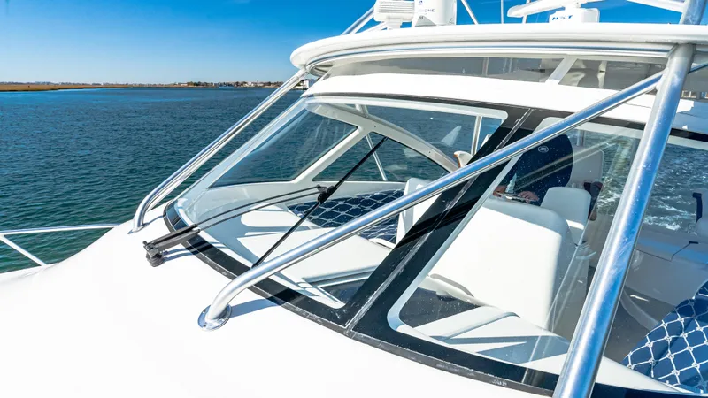  Yacht Photos Pics 2014 Viking 42 Open yacht with sleek design on calm water.