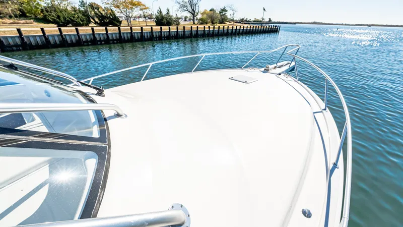  Yacht Photos Pics 2014 Viking 42 Open yacht on calm water, showcasing sleek deck design.