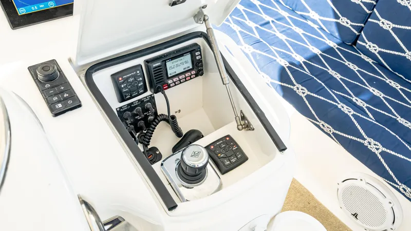  Yacht Photos Pics Control panel of 2014 Viking 42 Open yacht with communication devices and navigation controls.