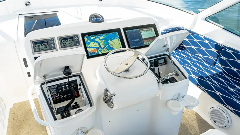  Yacht Photos Pics 2014 Viking 42 Open helm with navigation screens and controls.