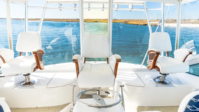  Yacht Photos Pics 2014 Viking 42 Open yacht interior with white seating and ocean view.