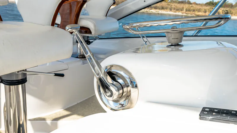  Yacht Photos Pics 2014 Viking 42 Open yacht helm with steering wheel and controls.