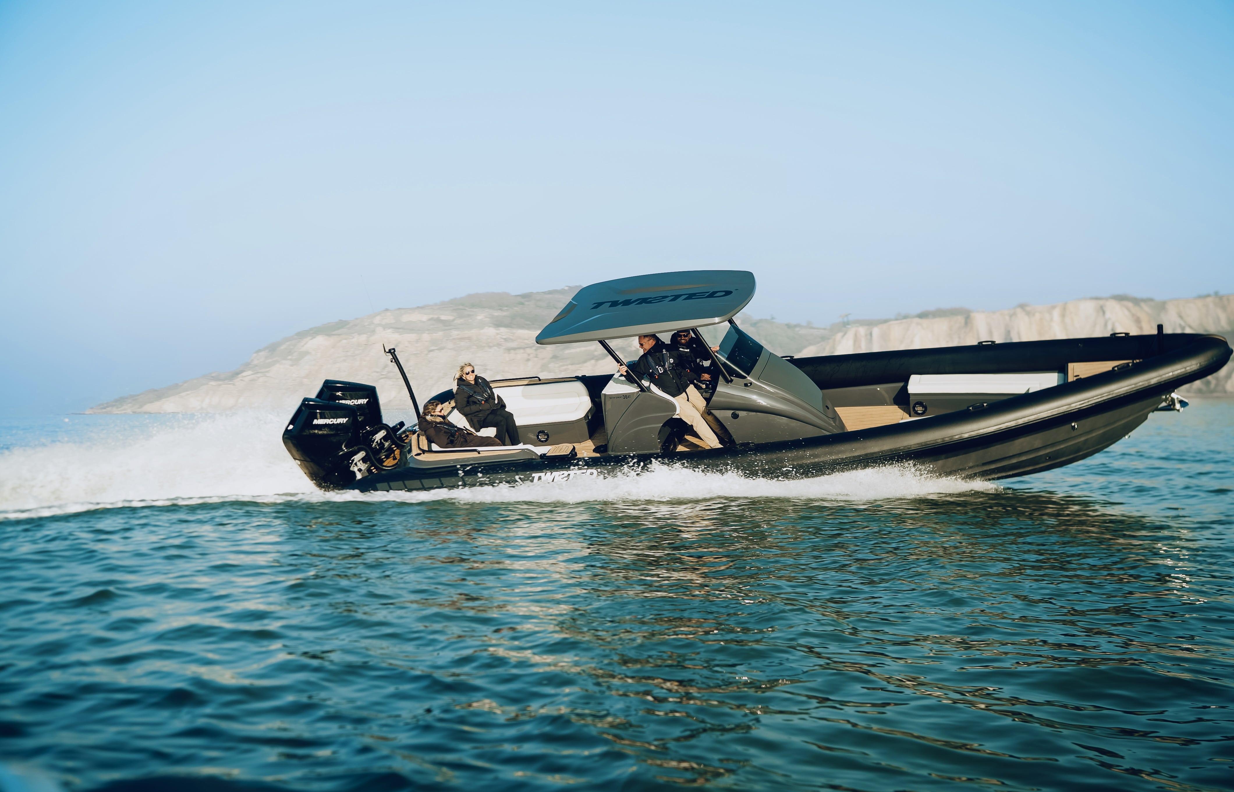 2025 Scorpion Grand Tourer 36 speedboat cruising on open water.