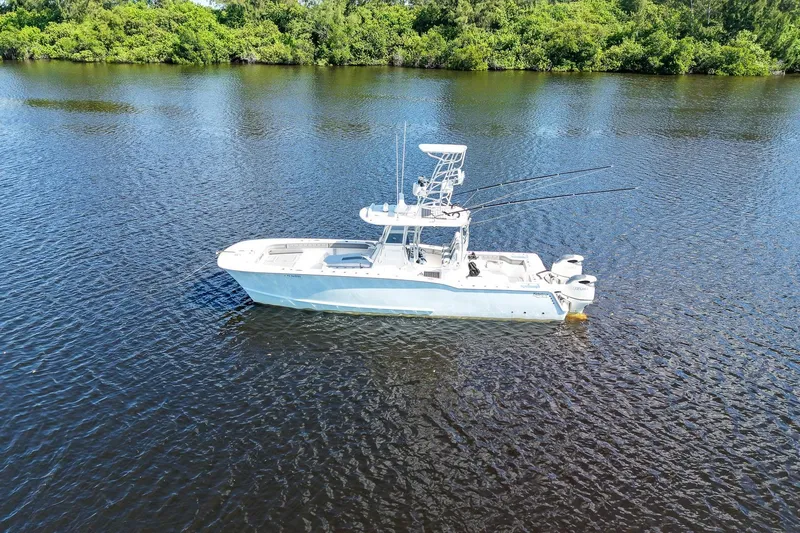  Yacht Photos Pics Aerial view of 2020 Tideline 365 Offshore boat on calm water.