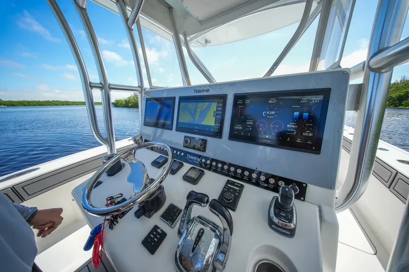  Yacht Photos Pics Helm of 2020 Tideline 365 Offshore boat with advanced navigation displays.