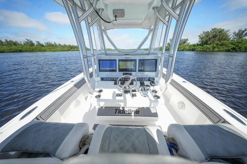  Yacht Photos Pics Cockpit view of 2020 Tideline 365 Offshore boat with advanced navigation systems.
