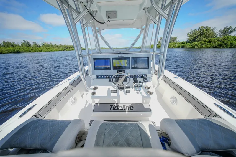  Yacht Photos Pics Cockpit view of 2020 Tideline 365 Offshore boat with advanced navigation systems.