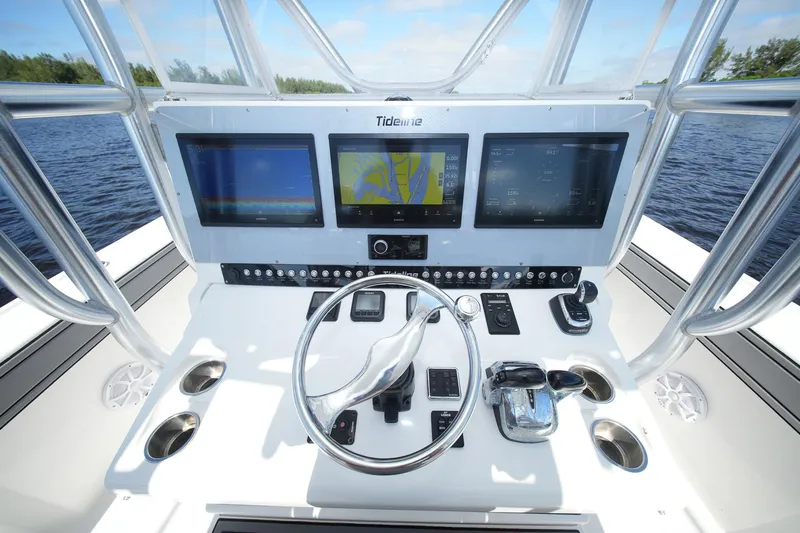  Yacht Photos Pics Helm of 2020 Tideline 365 Offshore boat with advanced navigation displays and controls.