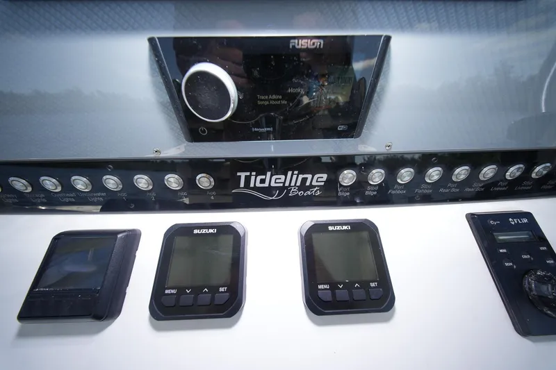  Yacht Photos Pics Control panel of 2020 Tideline 365 Offshore boat with Suzuki and FLIR displays.