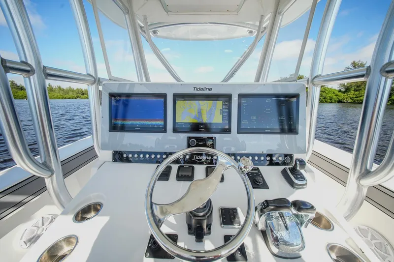  Yacht Photos Pics Cockpit of 2020 Tideline 365 Offshore boat with advanced navigation displays.