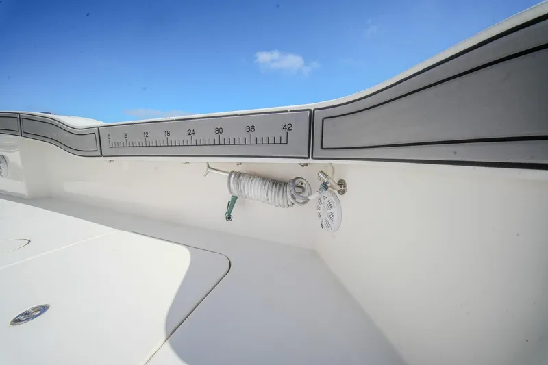  Yacht Photos Pics 2020 Tideline 365 Offshore boat interior with measuring scale and coiled rope.