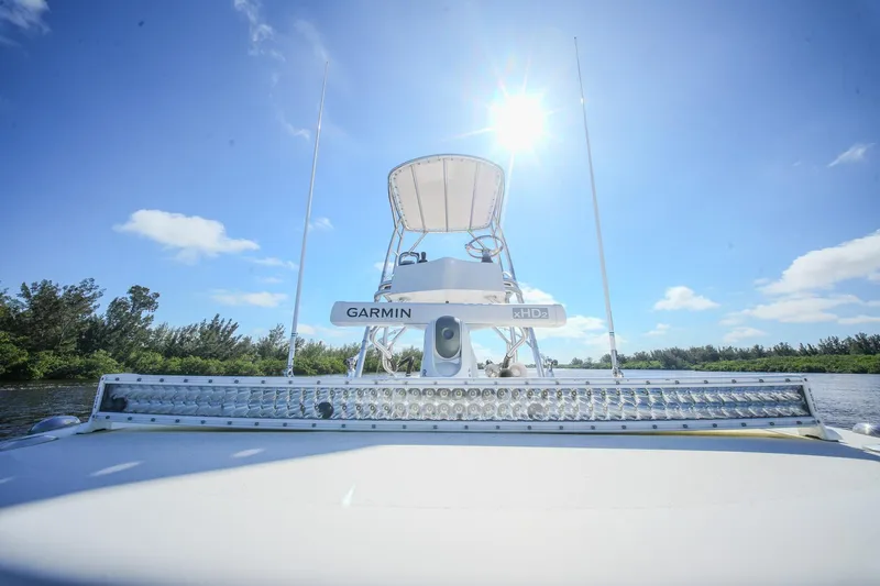  Yacht Photos Pics 2020 Tideline 365 Offshore boat with Garmin equipment under a bright blue sky.