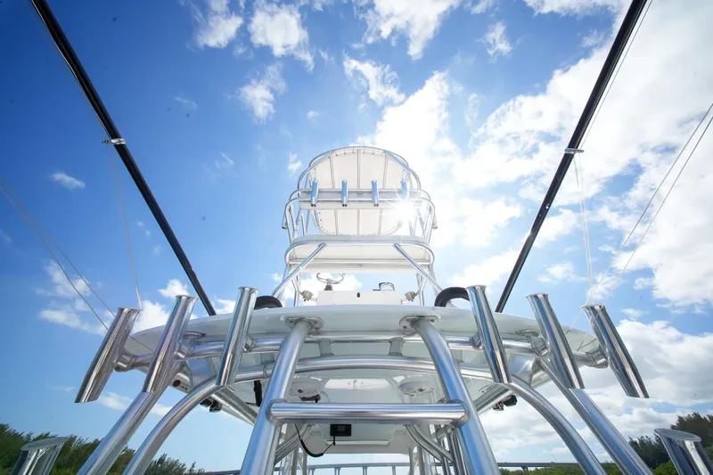 Yacht Photos Pics 2020 Tideline 365 Offshore boat tower against a bright blue sky.