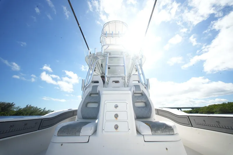  Yacht Photos Pics 2020 Tideline 365 Offshore boat under bright sun and blue sky.