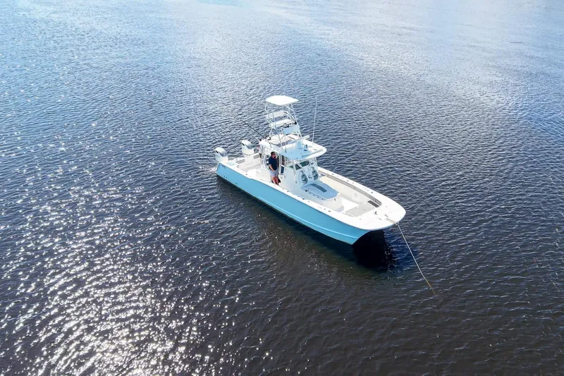  Yacht Photos Pics Aerial view of 2020 Tideline 365 Offshore boat on calm water.