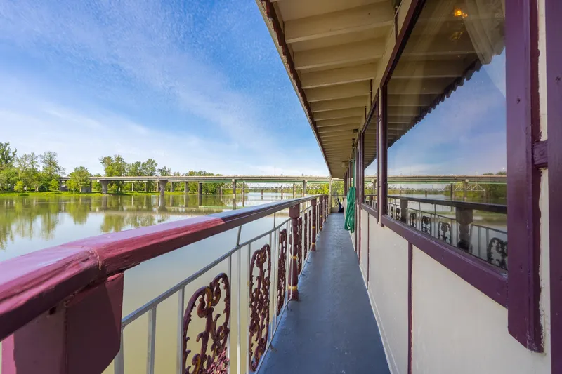 Willamette Queen Yacht Photos Pics Side view of 1990 Custom Howdy Eidelman Sternwheeler on a calm river.