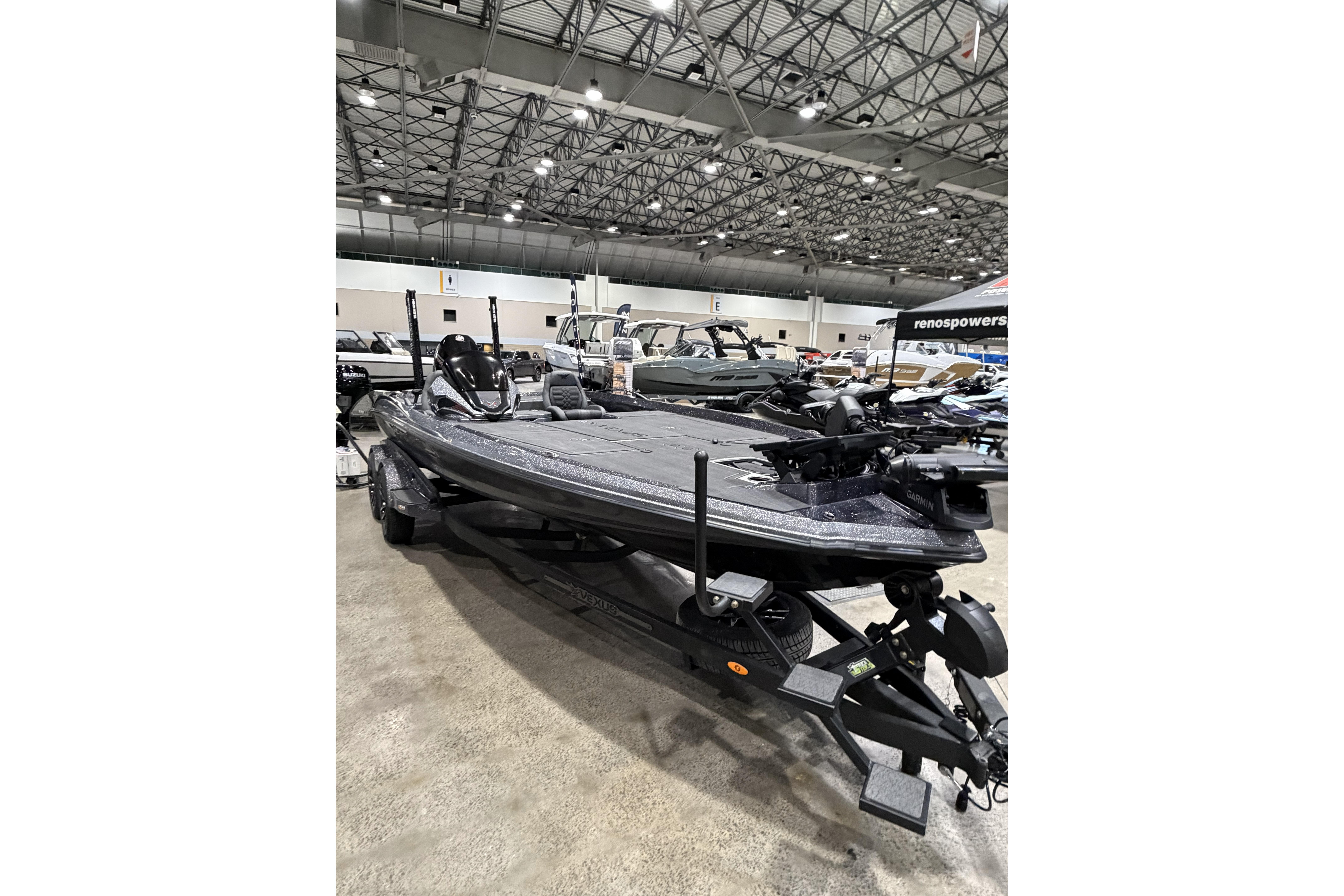 2026 Vexus boat on display in a showroom with modern design features.