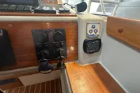 Control panel of a 2001 Nimbus 345 Coupe boat with anchor winch controls.