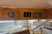 Control panel of a 2001 Nimbus 345 Coupe boat with various instruments.