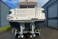 Rear view of a 2001 Nimbus 345 Coupe boat on a trailer.