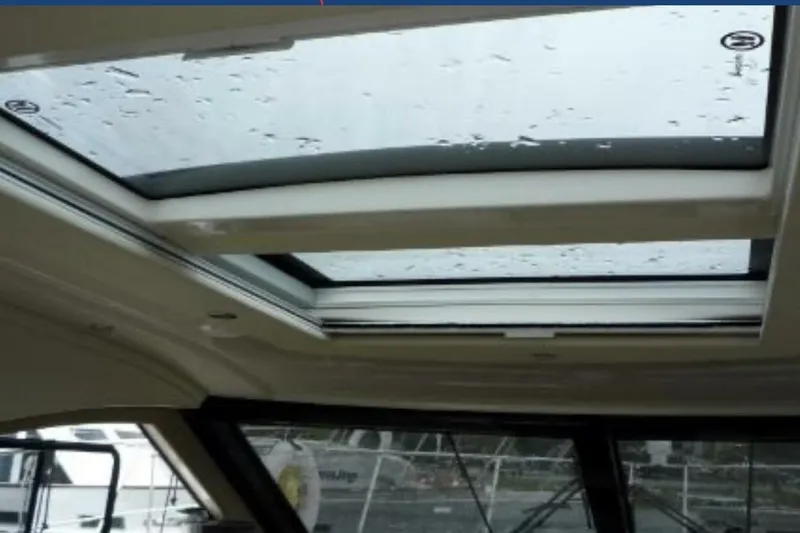  Yacht Photos Pics Carver C37 2017 yacht interior with a sleek sunroof and raindrops.