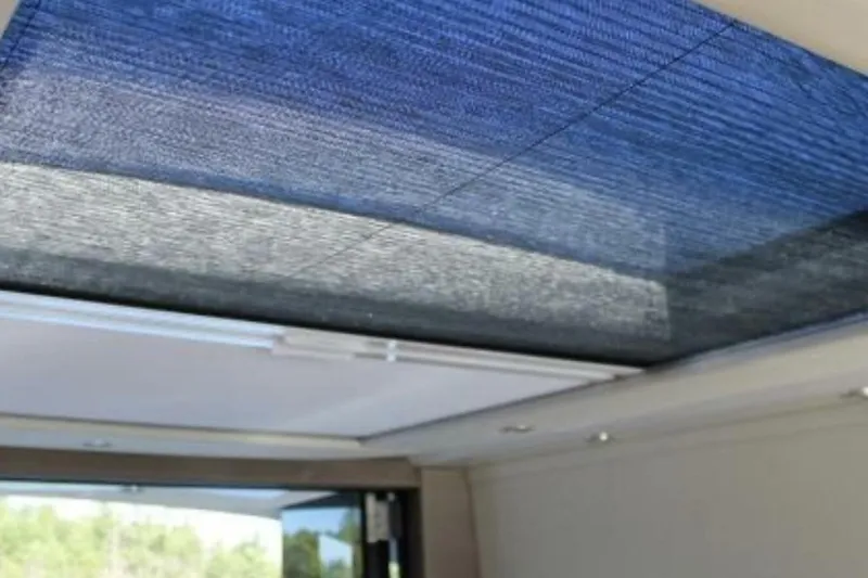  Yacht Photos Pics Interior view of 2017 Carver C37 yacht with blue sunshade.