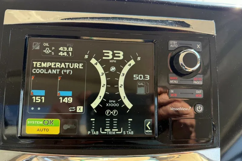  Yacht Photos Pics Dashboard display of a 2017 Carver C37 showing speed, coolant temperature, and oil pressure.