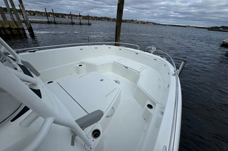  Yacht Photos Pics 2023 Jeanneau Leader 9.0 CC boat docked on a cloudy day.
