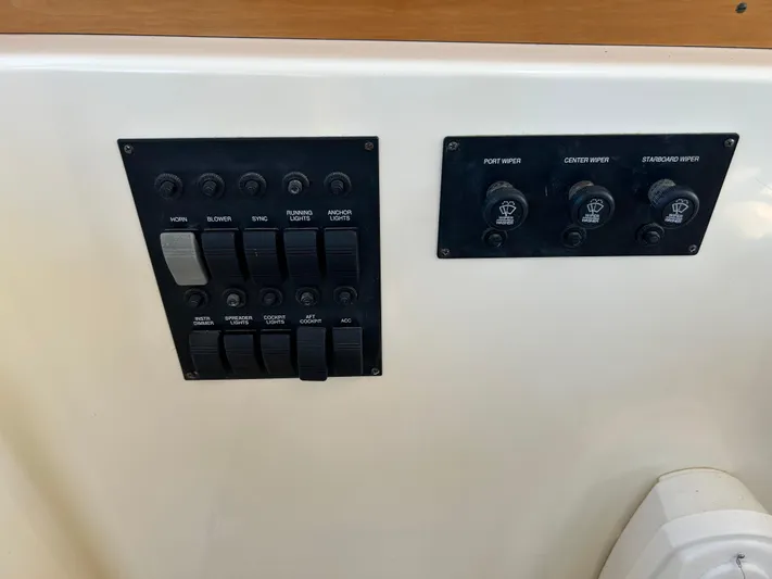 Bravo Yacht Photos Pics Control panel of 2005 Sabre 42 Hardtop Express boat with switches and dials.