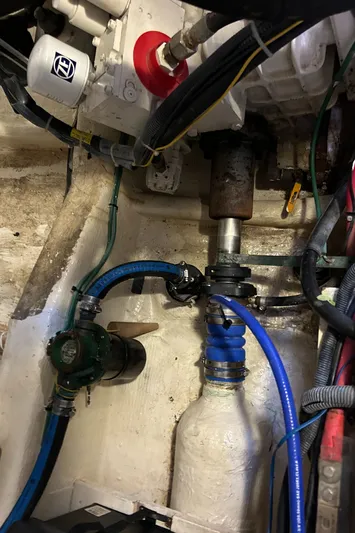 Bravo Yacht Photos Pics Engine compartment of 2005 Sabre 42 Hardtop Express with visible hoses and components.