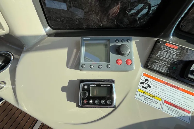 Sonship Yacht Photos Pics Control panel of 2006 Sea Ray 380 Sundancer with navigation and audio systems.