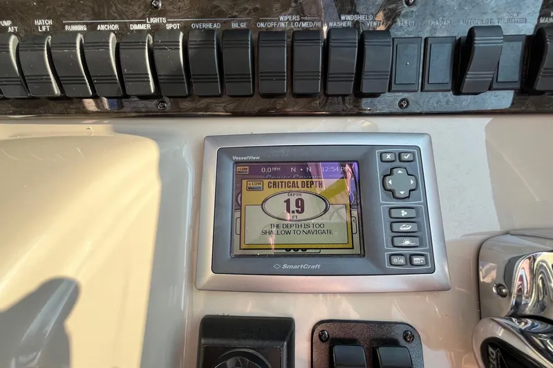 Sonship Yacht Photos Pics Control panel of 2006 Sea Ray 380 Sundancer showing critical depth warning.