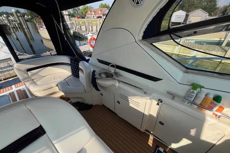 Sonship Yacht Photos Pics Interior of 2006 Sea Ray 380 Sundancer yacht with seating and sink area.