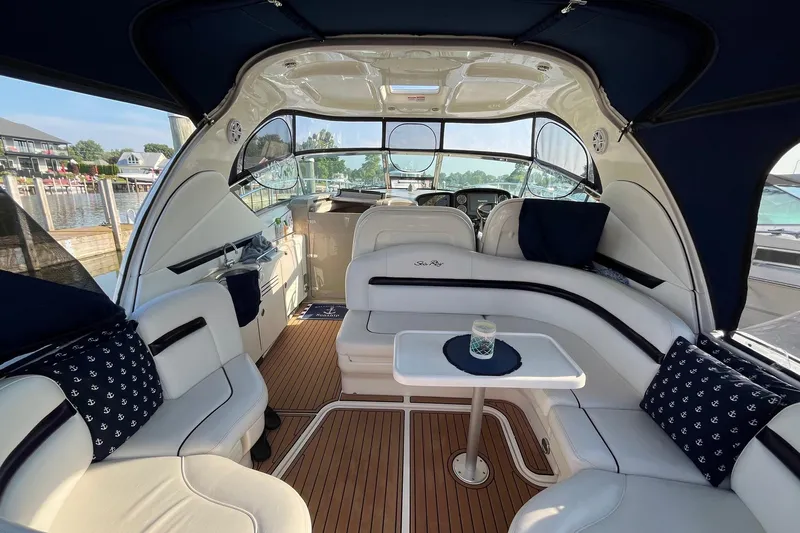 Sonship Yacht Photos Pics Luxurious 2006 Sea Ray 380 Sundancer interior with elegant seating and nautical decor.