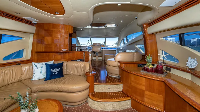  Yacht Photos Pics Luxurious interior of a 2007 Azimut 62 Flybridge yacht with elegant wood finishes.