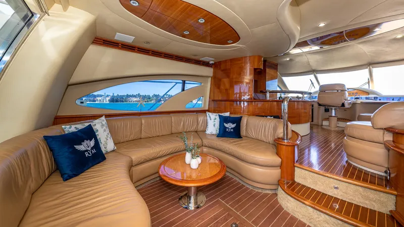  Yacht Photos Pics Luxurious interior of a 2007 Azimut 62 Flybridge yacht with elegant seating and wood finishes.